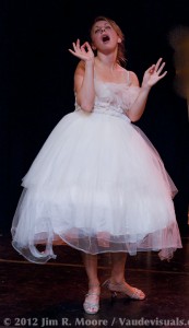 Summre Shapiro in her show In The Boudoir with a white dress.