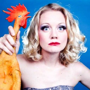 Juliet Jeske holding a rubber chicken 