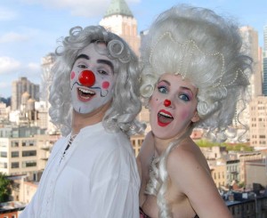 Mister and Missus Clown wearing clown noses and white hair