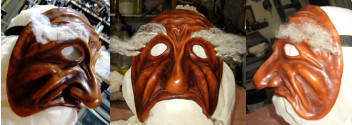 rigfht, front, left image of Pantalone, old man mask with long white eyebrows.  