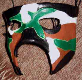 Supa Soul-ja half mask with a brown, green, black and white camouflage pattern.